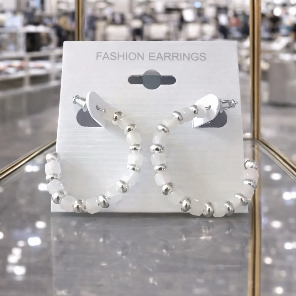 Silver and white beaded hoop earrings